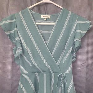 Green striped v-neck blouse